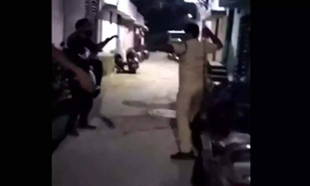 Police brutally beat a young man in Hyderabad