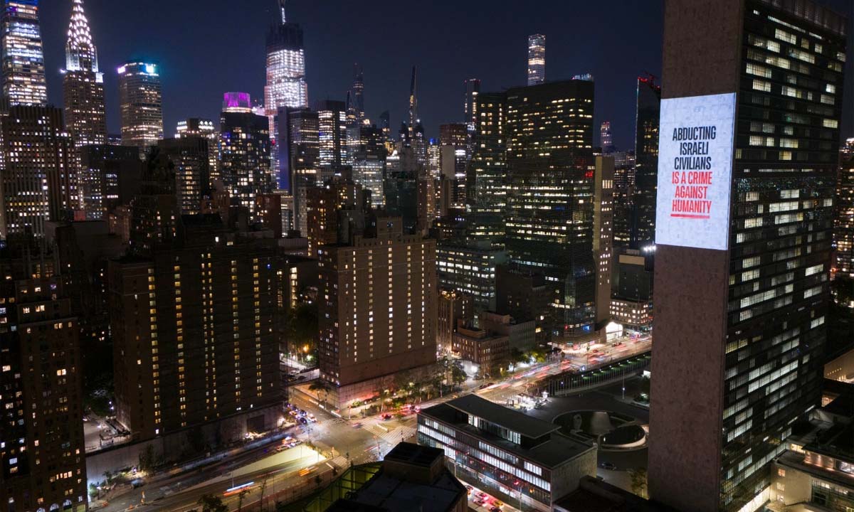 Israeli hostages' images projected at UN HQ, demanding their release