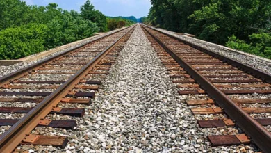 ACCESS BLOCKED: Utorda residents gather near railway track to protest against road closure