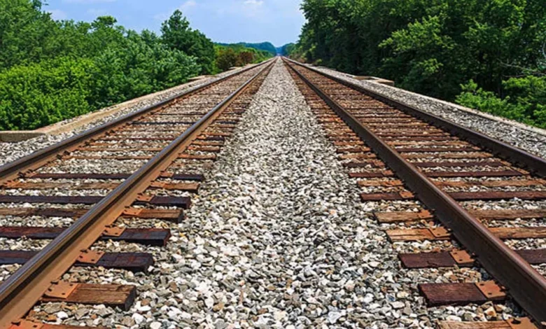 ACCESS BLOCKED: Utorda residents gather near railway track to protest against road closure