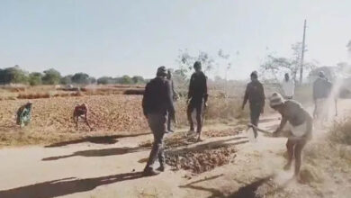 It is the villagers, not the government, who are repairing the bad roads. Watch video.
