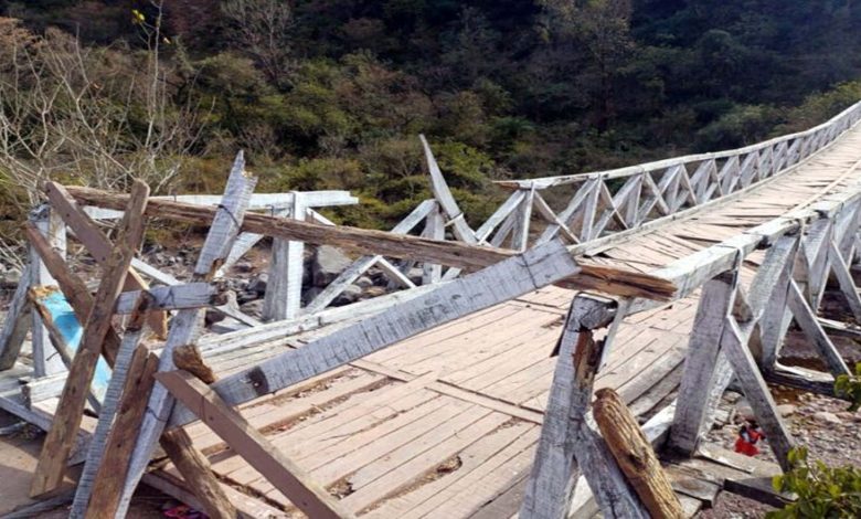 Villagers protest for repair of wooden bridge