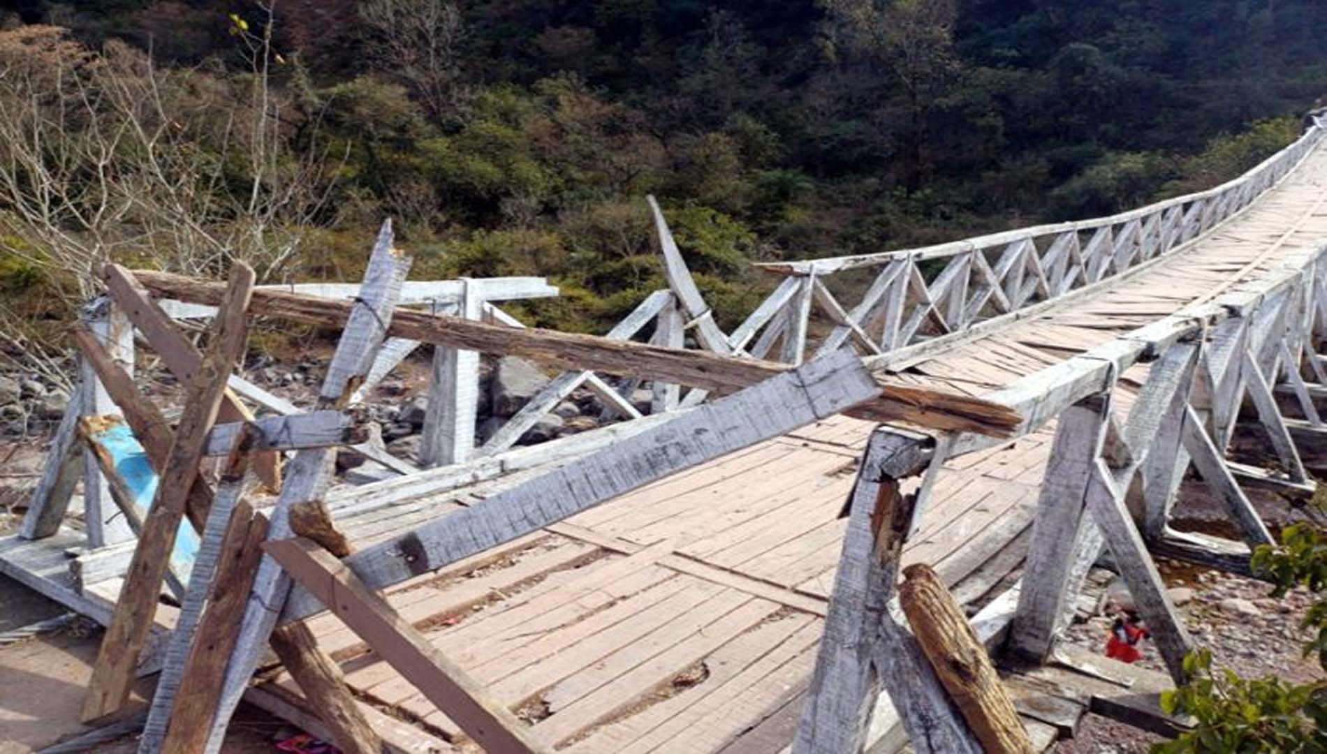 Villagers protest for repair of wooden bridge