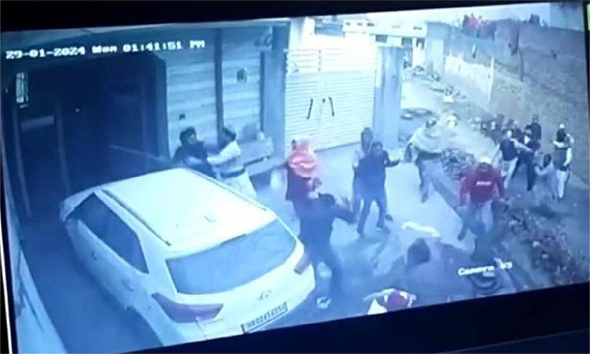 Bloody conflict over land dispute, fighting with sticks between families, captured in CCTV