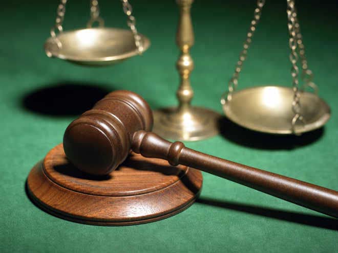 Bishnoi aide hurt in group clash at court