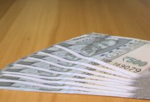 Rupee falls on weak global cues and FII outflows